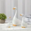 4d065353-eee9-409c-abda-8054ba34587e.webp Art Deco Goose Resin Statues – 3pcs