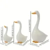739d08aa-4b40-41cc-a98b-e88f45a8b87a.webp Art Deco Goose Resin Statues – 3pcs