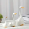 9744d7c2-597b-4c66-8e9d-b6092aa26de4.webp Art Deco Goose Resin Statues – 3pcs