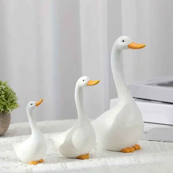 9744d7c2-597b-4c66-8e9d-b6092aa26de4.webp Art Deco Goose Resin Statues – 3pcs